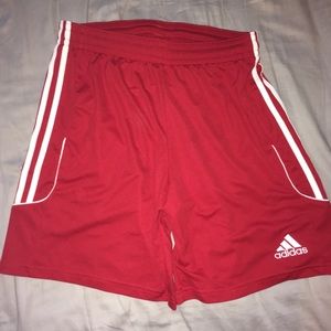Red adidas athletic shorts